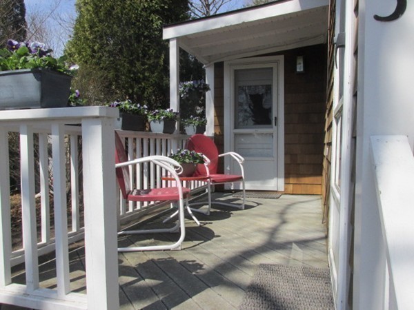 3 Brooks Road Rockport, MA 01966 - Photo 19 of 26 a view of a wooden chairs with a outdoor space