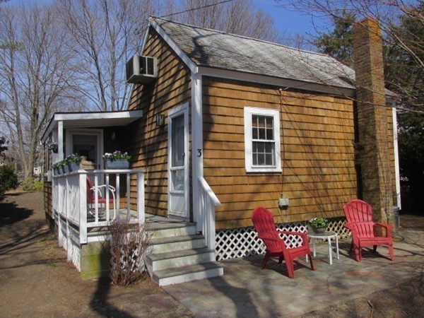 3 Brooks Road Rockport, MA 01966 - Photo 2 of 26 a front view of a house with outdoor seating