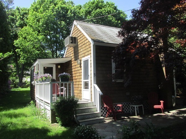 3 Brooks Road Rockport, MA 01966 - Photo 24 of 26 a front view of house with a garden