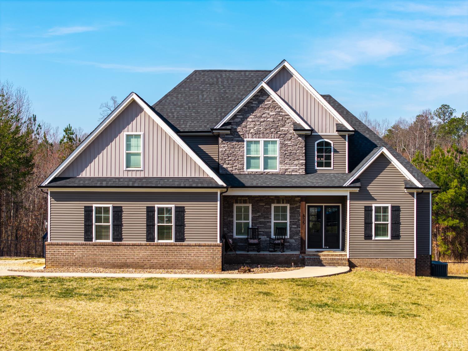 835 Sunset Ridge Drive Concord, VA 24538 - Photo 1 of 57 a front view of a house with a yard