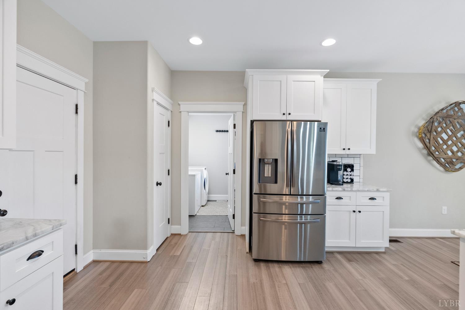 835 Sunset Ridge Drive Concord, VA 24538 - Photo 17 of 57 a kitchen with a refrigerator and a wooden floor