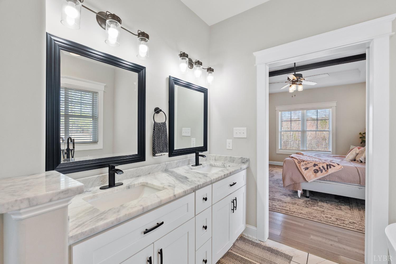 835 Sunset Ridge Drive Concord, VA 24538 - Photo 21 of 57 a en suite bathroom with double sink and a mirror