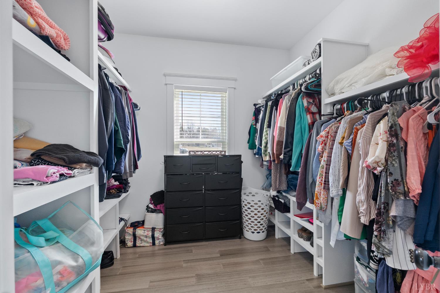 835 Sunset Ridge Drive Concord, VA 24538 - Photo 23 of 57 a view of walk in closet with clothes and shoes