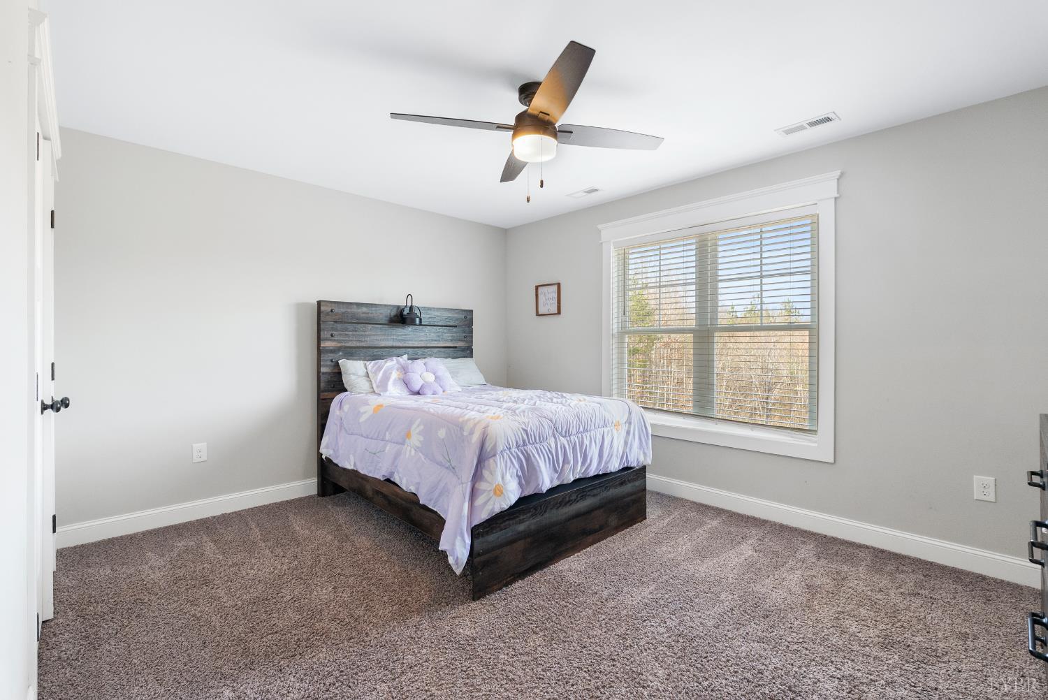 835 Sunset Ridge Drive Concord, VA 24538 - Photo 30 of 57 a bed room with a bed and a window