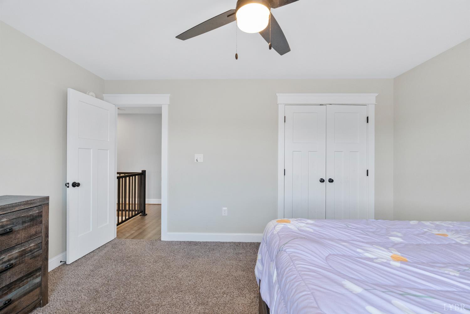 835 Sunset Ridge Drive Concord, VA 24538 - Photo 31 of 57 a bedroom with a bed and cabinets