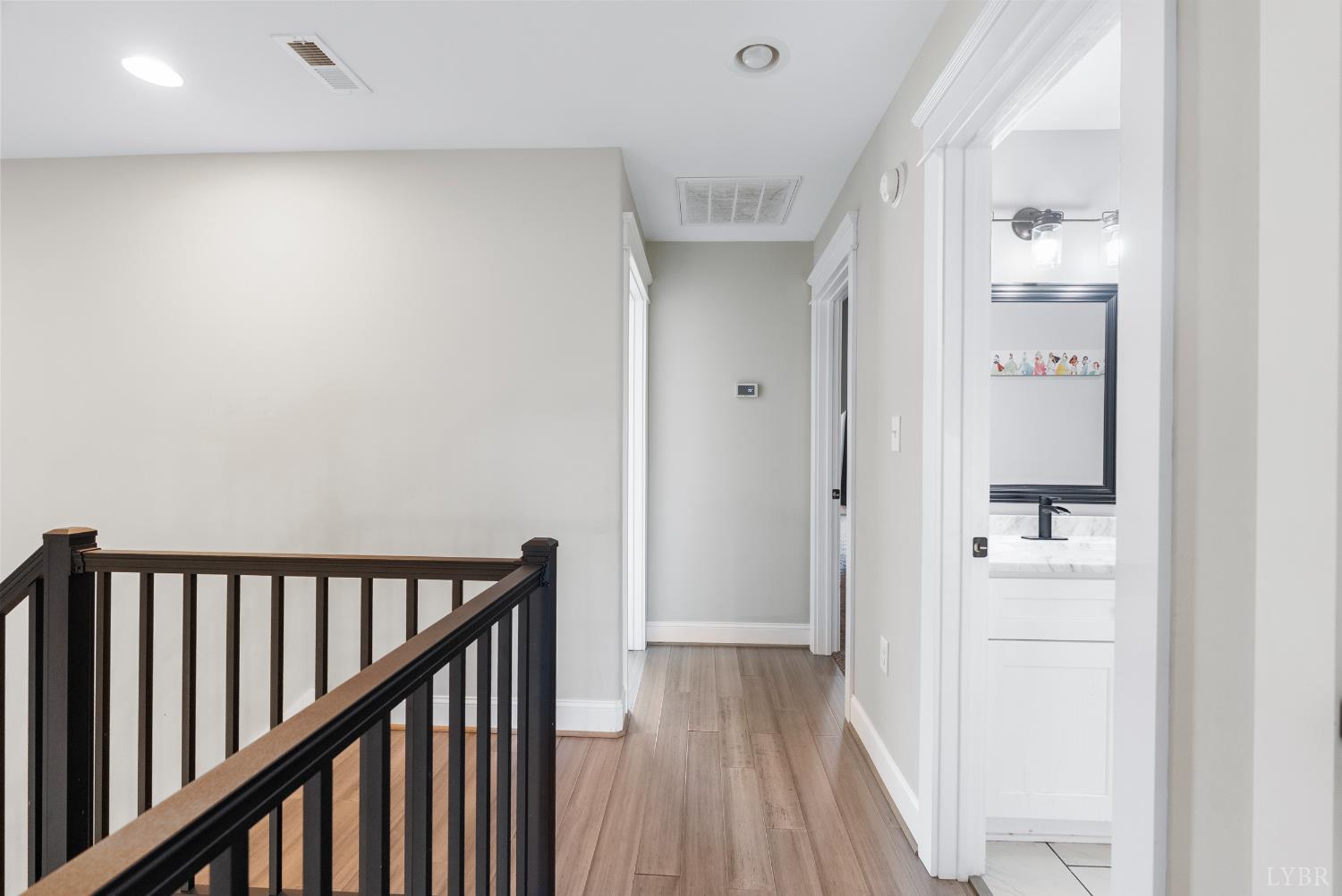 835 Sunset Ridge Drive Concord, VA 24538 - Photo 32 of 57 a view of a hallway with wooden floor