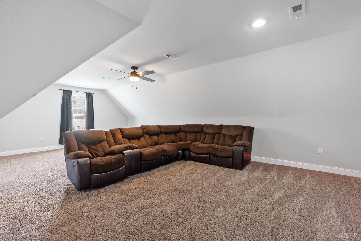835 Sunset Ridge Drive Concord, VA 24538 - Photo 33 of 57 a living room with furniture and a ceiling fan