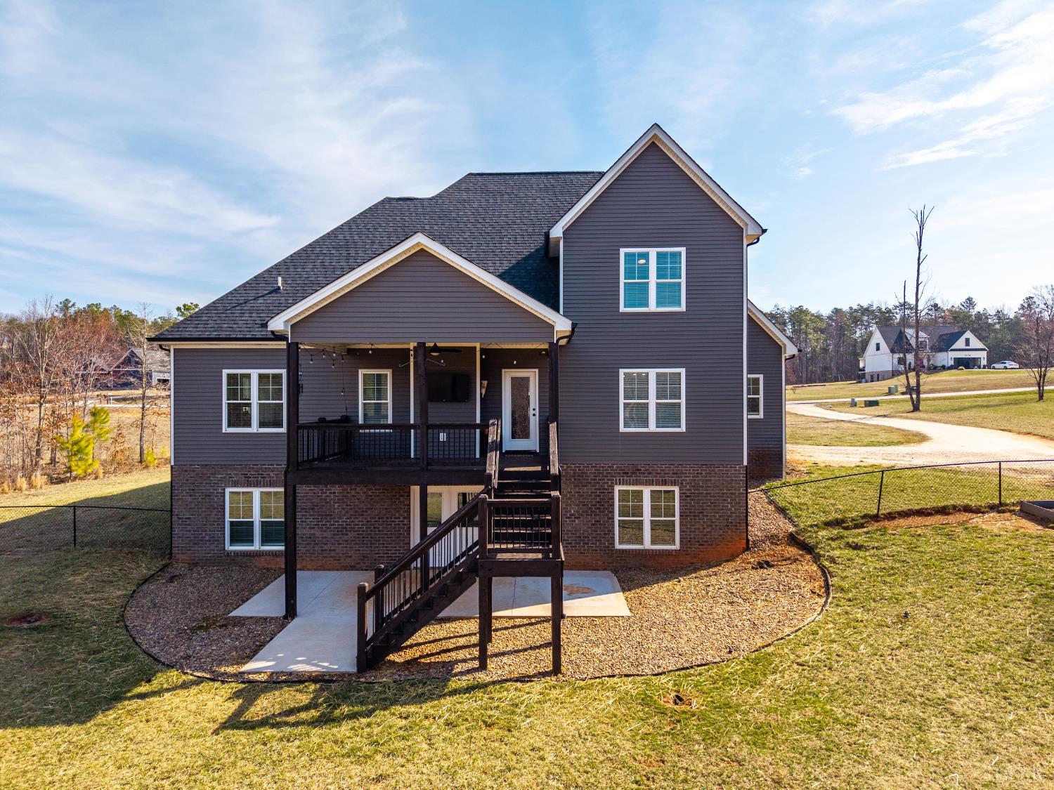 835 Sunset Ridge Drive Concord, VA 24538 - Photo 4 of 57 a front view of a house with a yard