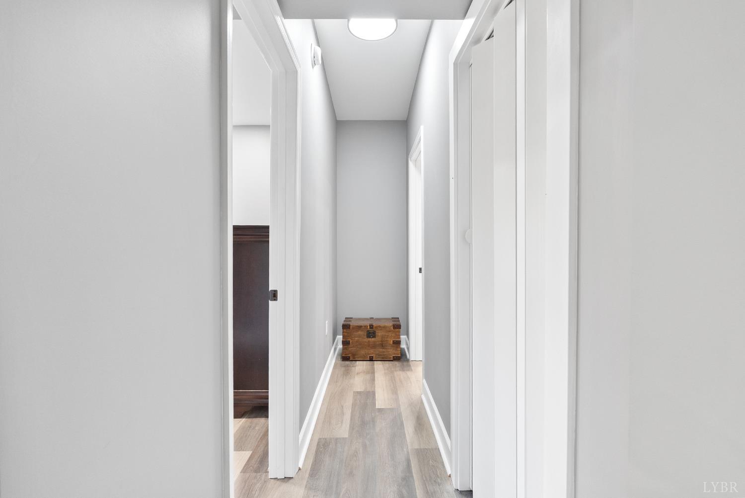 835 Sunset Ridge Drive Concord, VA 24538 - Photo 45 of 57 a view of a hallway with wooden floor and a window