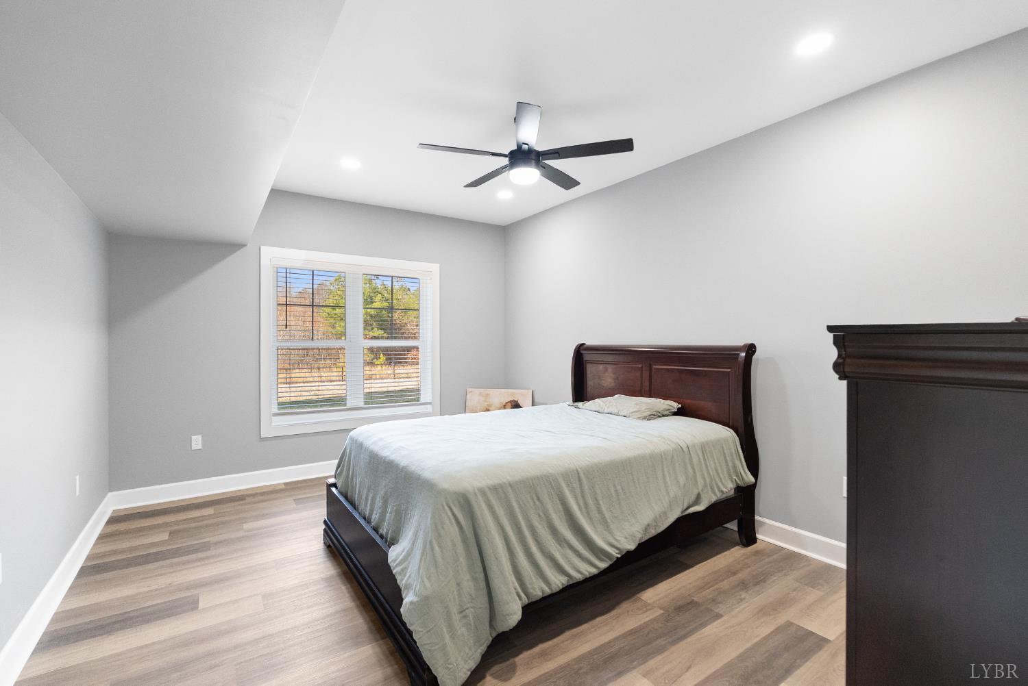 835 Sunset Ridge Drive Concord, VA 24538 - Photo 46 of 57 a bedroom with a bed and window
