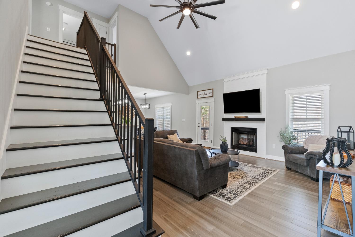 835 Sunset Ridge Drive Concord, VA 24538 - Photo 7 of 57 a living room with furniture and a fireplace