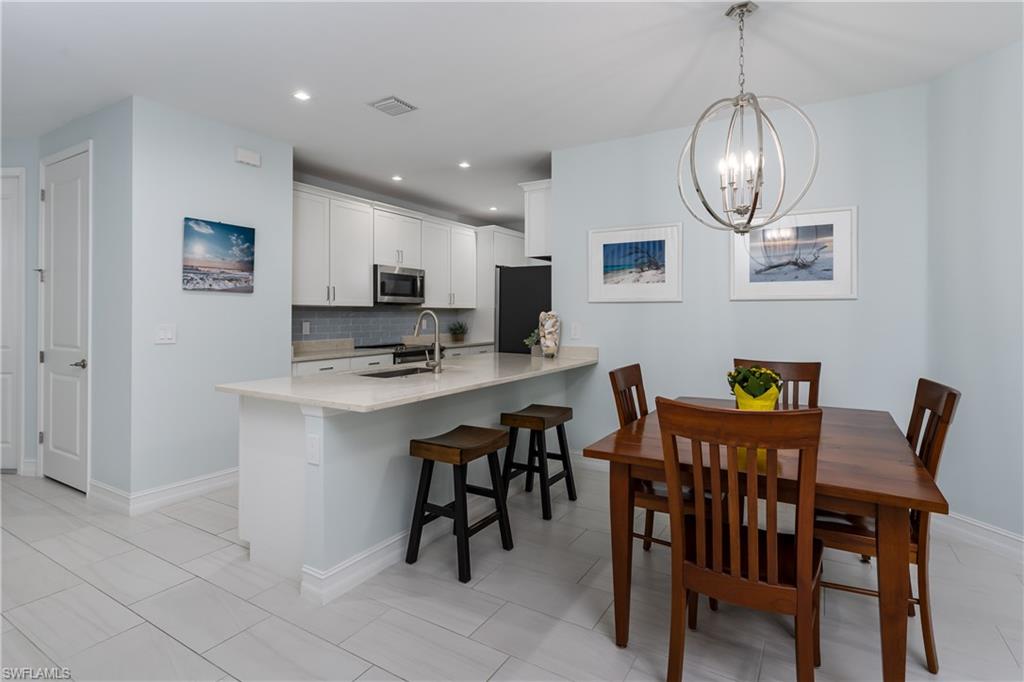 a view of kitchen with breakfast area