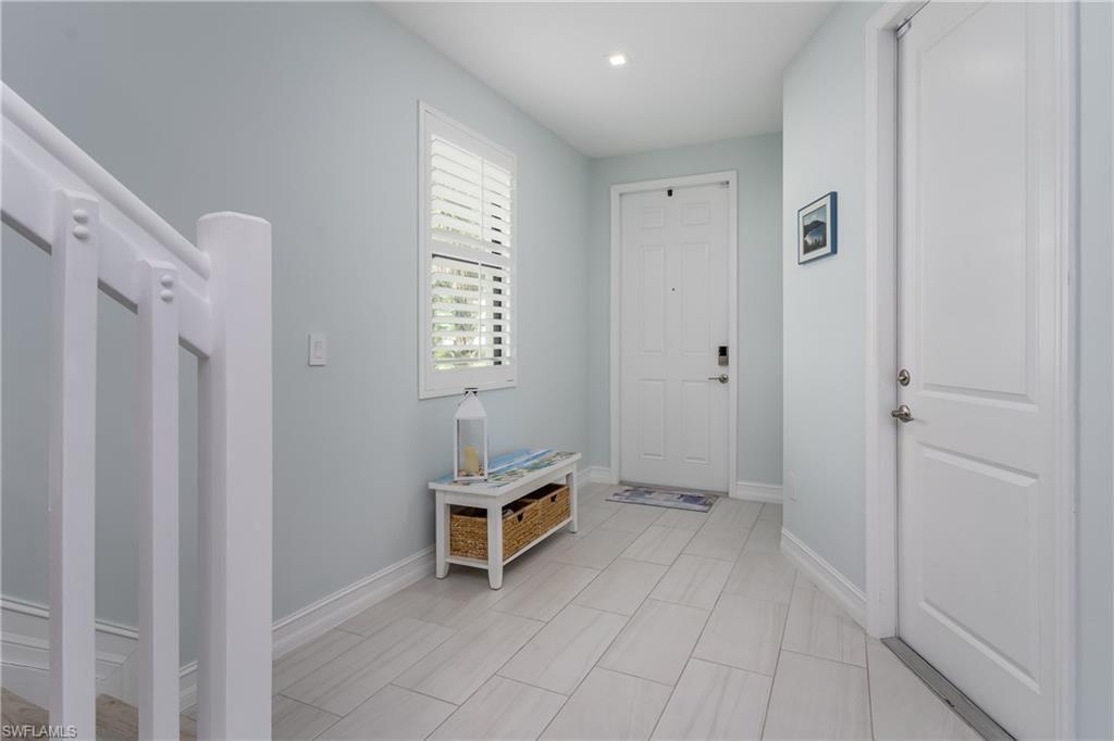 7336 Rockefeller Drive Naples, FL 34119 - Photo 10 of 50 a view of an empty room with a window
