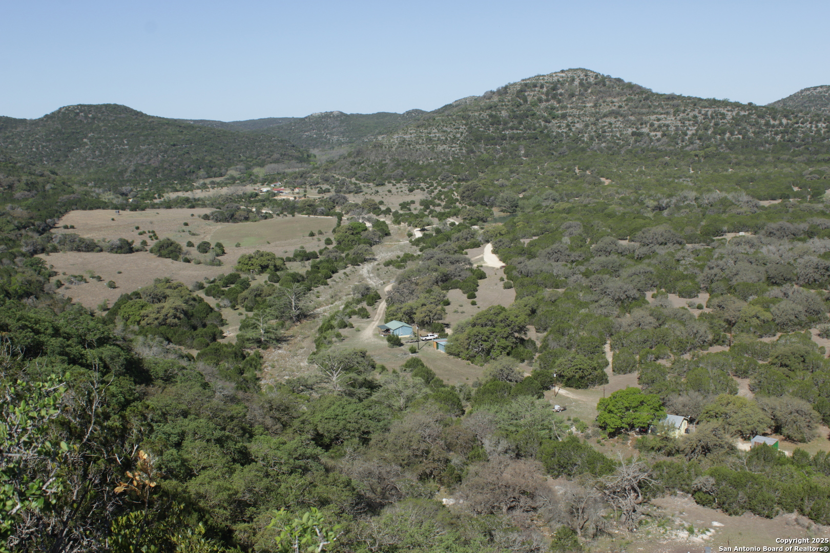 1976 Cedar Creek Road Leakey, TX 78873 - Photo 10 of 21 a view of a mountain in the distance