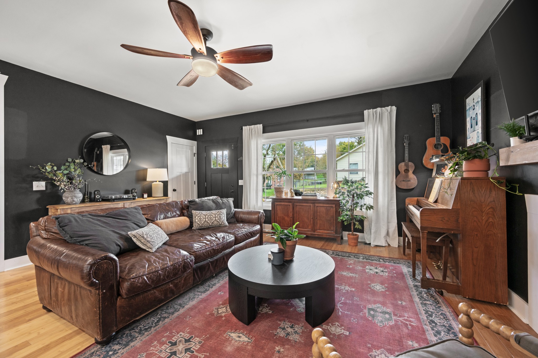 108 Poplar Street Dickson, TN 37055 - Photo 12 of 39 a living room with furniture and a large window