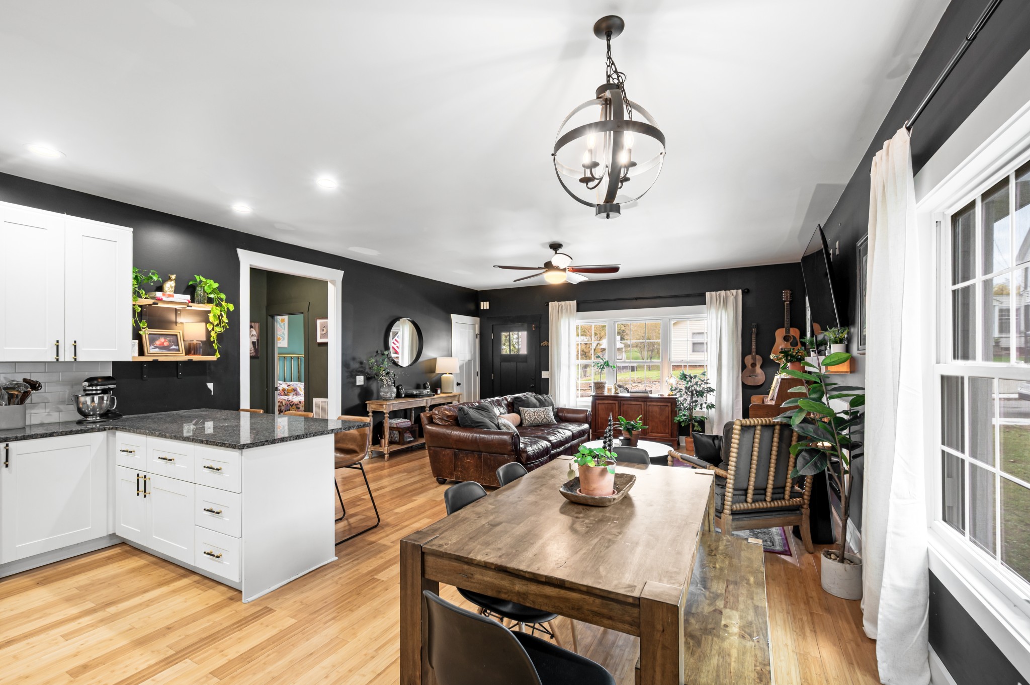 108 Poplar Street Dickson, TN 37055 - Photo 15 of 39 a view of a dining room with furniture window and wooden floor