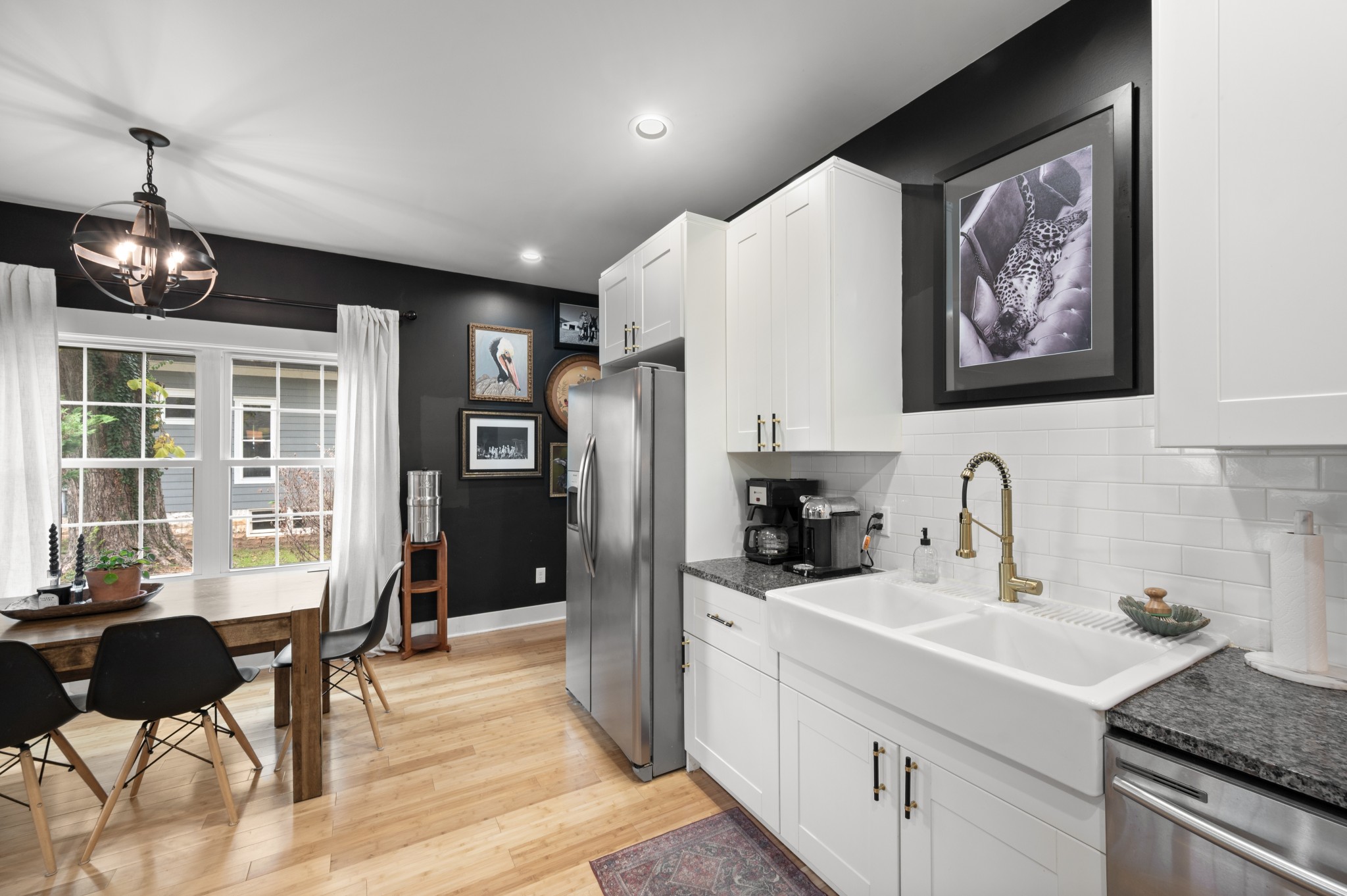 108 Poplar Street Dickson, TN 37055 - Photo 20 of 39 a kitchen with stainless steel appliances a sink stove and refrigerator