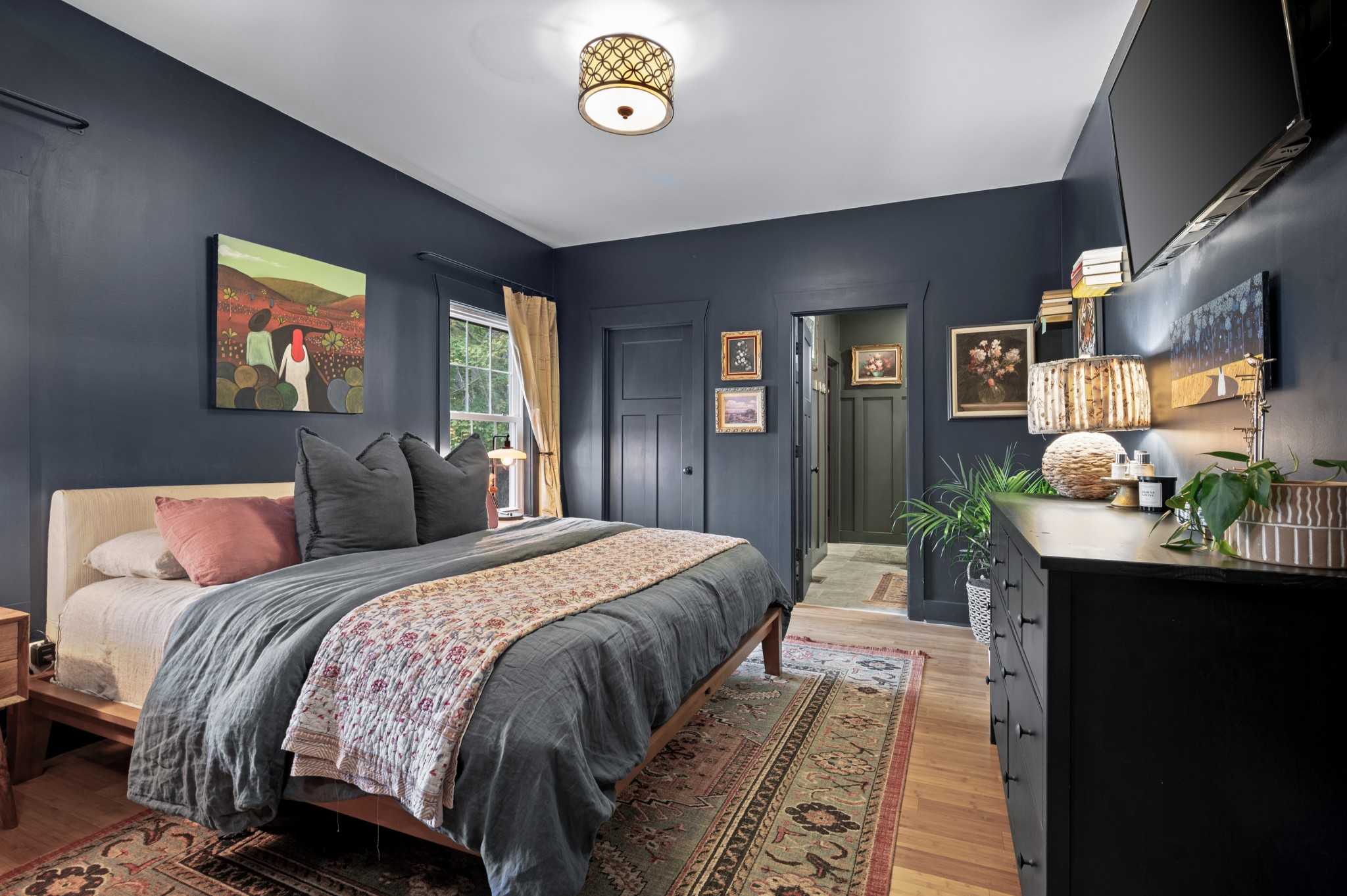 108 Poplar Street Dickson, TN 37055 - Photo 21 of 39 a bedroom with a bed and a desk