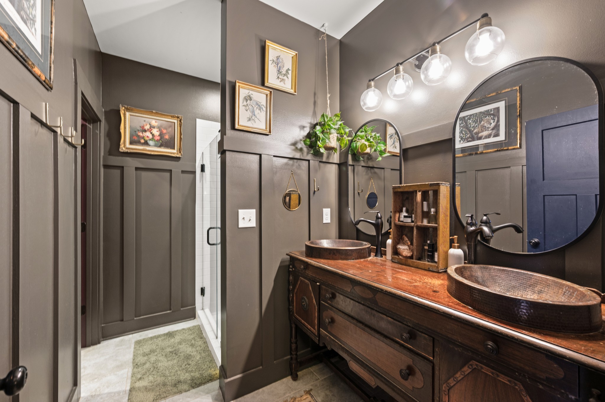108 Poplar Street Dickson, TN 37055 - Photo 24 of 39 a bathroom with double vanity and a mirror