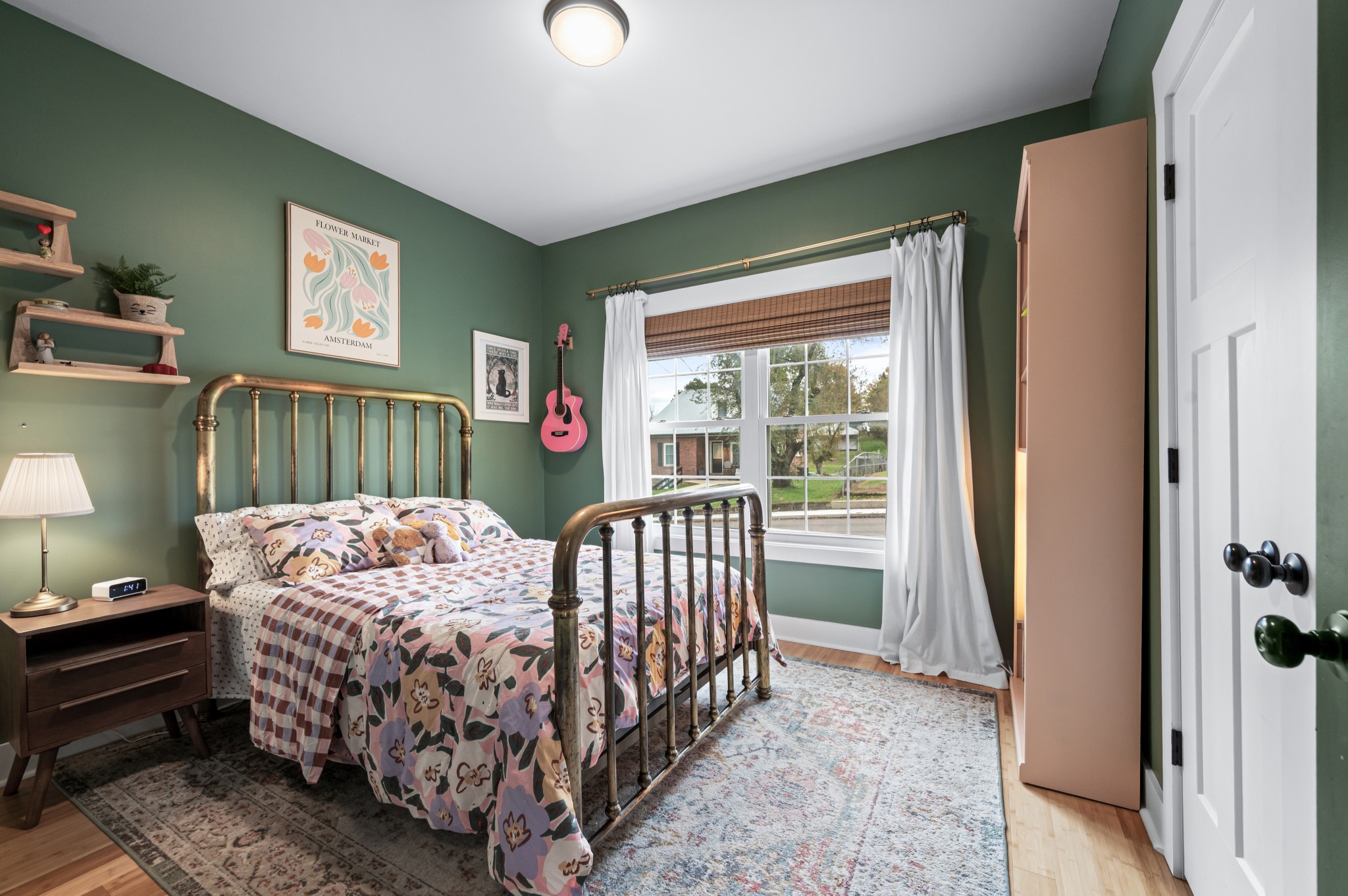 108 Poplar Street Dickson, TN 37055 - Photo 27 of 39 a bedroom with a bed and a window