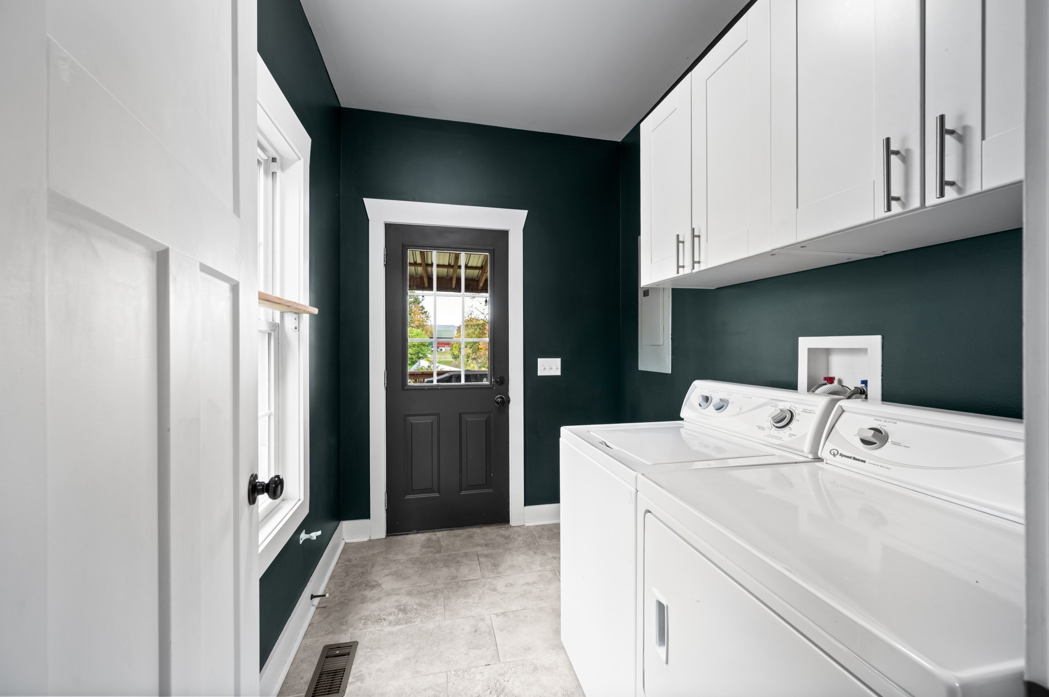 108 Poplar Street Dickson, TN 37055 - Photo 32 of 39 a utility room with dryer and washer