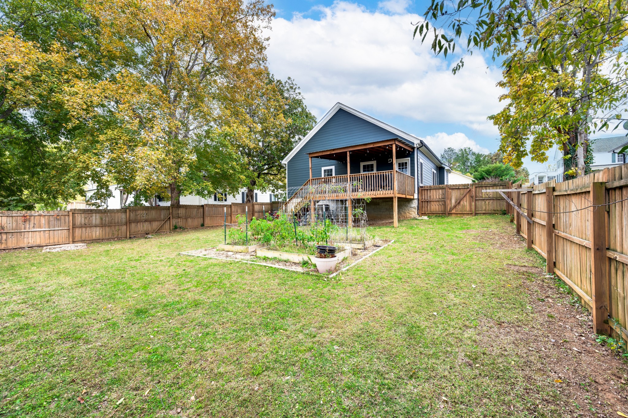 108 Poplar Street Dickson, TN 37055 - Photo 37 of 39 a view of a house with a yard and sitting area