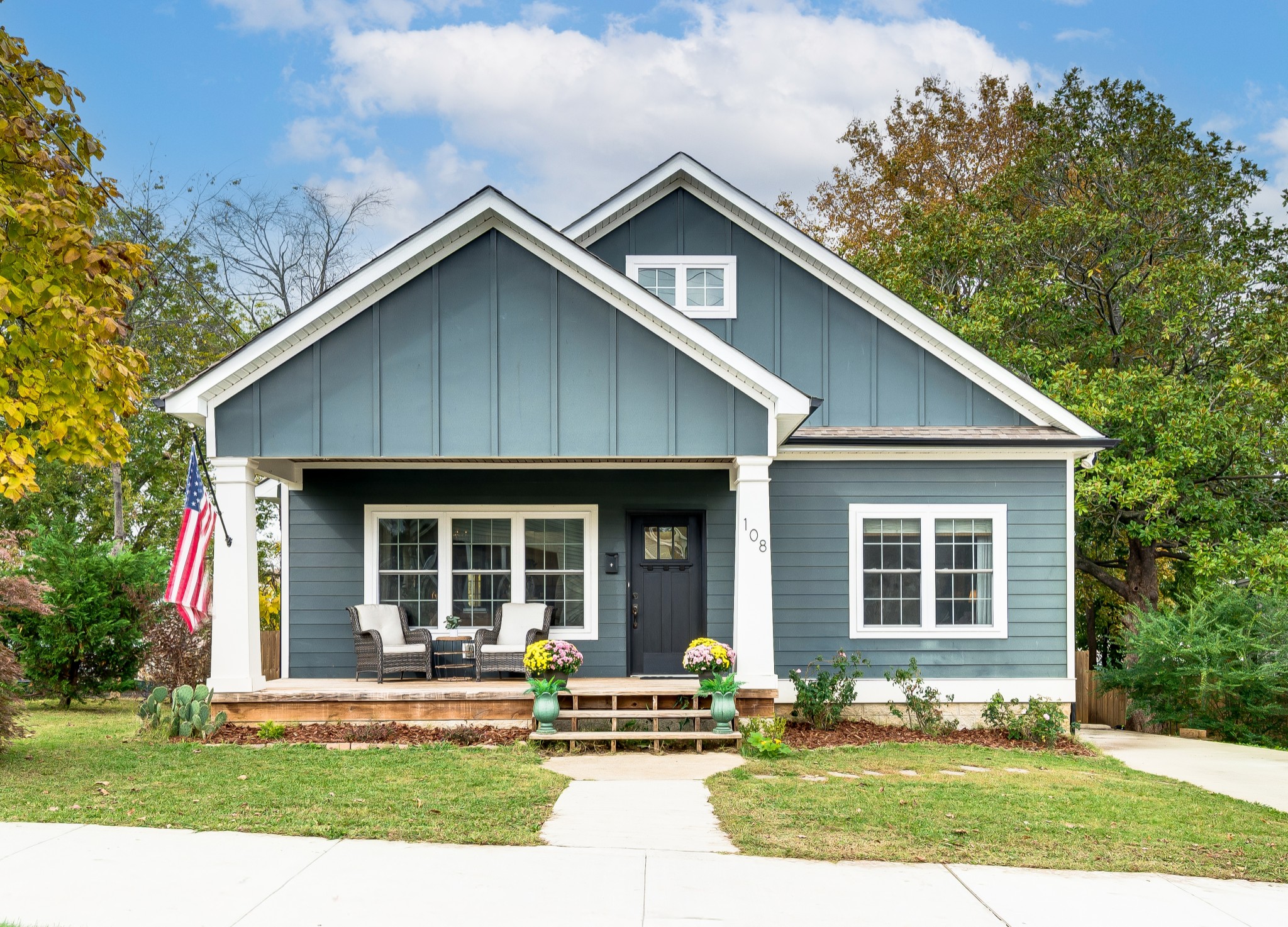 108 Poplar Street Dickson, TN 37055 - Photo 4 of 39 a front view of a house with a yard