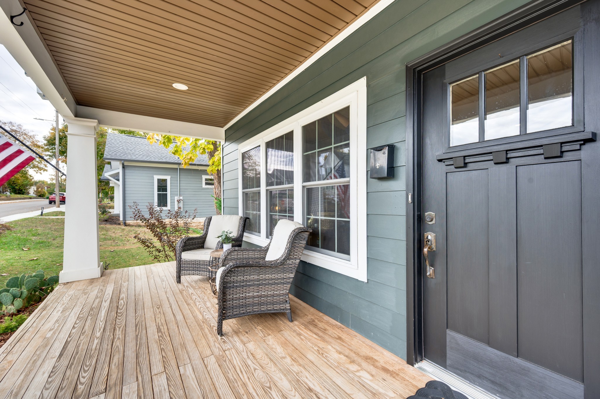 108 Poplar Street Dickson, TN 37055 - Photo 7 of 39 a balcony with furniture and wooden floor