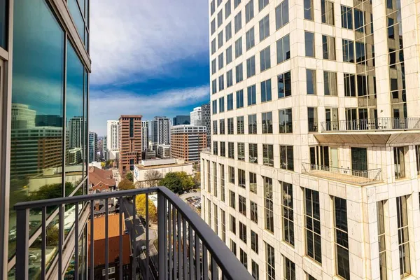 a view of a building from a balcony