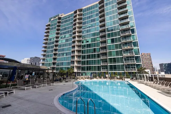 a view of a building with sitting area