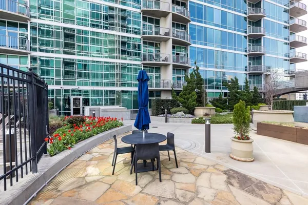a view of a building with sitting area