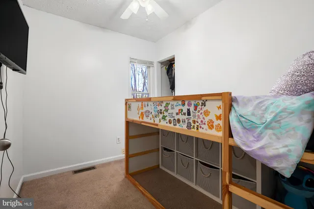 a view of a deck with table and chairs and wooden floor