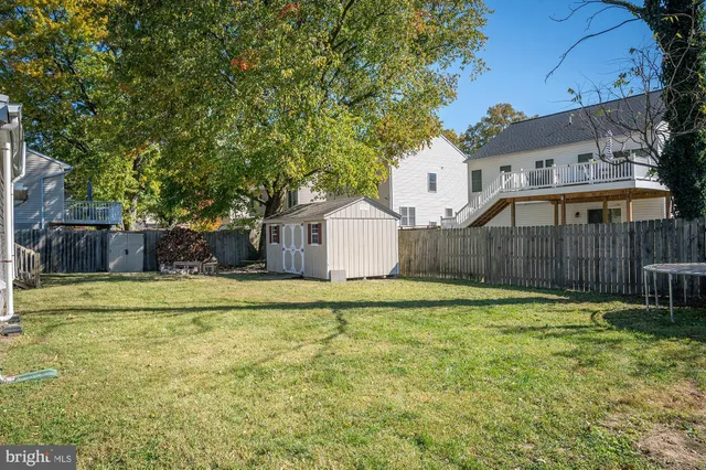 a view of a wooden door of the house