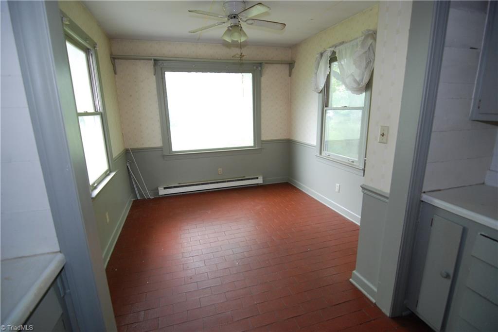 1036 Covington House Road Walnut Cove, NC 27052 - Photo 18 of 29 Another view of breakfast nook. Enjoy a morning breakfast looking out that window to your beautiful yard.
