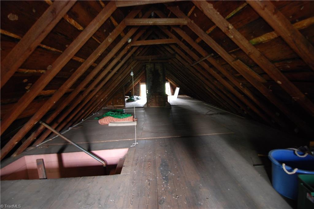1036 Covington House Road Walnut Cove, NC 27052 - Photo 22 of 29 The floored attic expands the entire length of the home