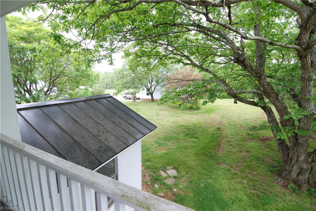 1036 Covington House Road Walnut Cove, NC 27052 - Photo 28 of 29 Another view from the upper rear porch that shows the 3 car garage.