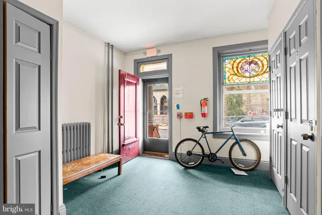 a view of swimming pool with furniture