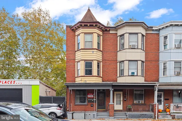 a front view of a multi story residential apartment building