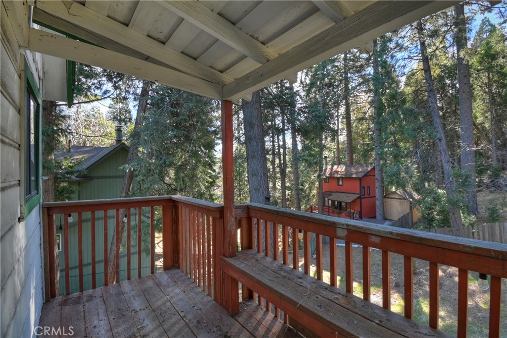 26331 Alpine Lane Twin Peaks, CA 92391 - Photo 15 of 41 a view of a two chairs in the deck