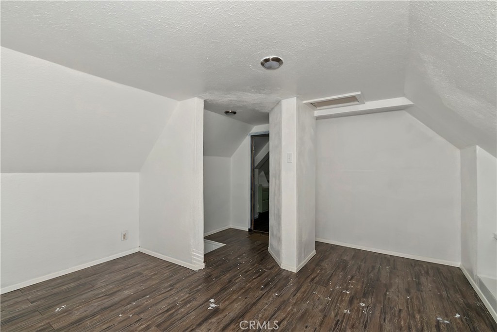 26331 Alpine Lane Twin Peaks, CA 92391 - Photo 22 of 41 a view of a room with wooden floor