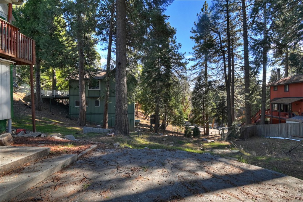 26331 Alpine Lane Twin Peaks, CA 92391 - Photo 30 of 41 a view of street with large trees