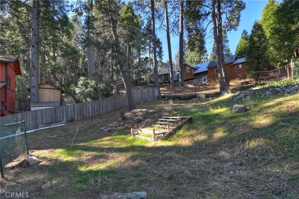 26331 Alpine Lane Twin Peaks, CA 92391 - Photo 40 of 41 a view of a backyard with trees