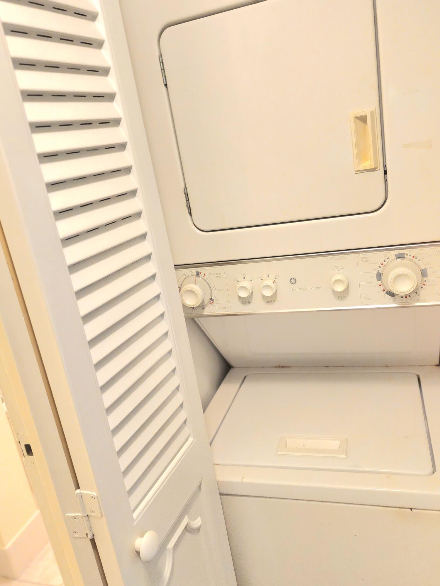 3959 Via Poinciana, Unit 208 Lake Worth, FL 33467 - Photo 24 of 32 a close up view of washer and dryer