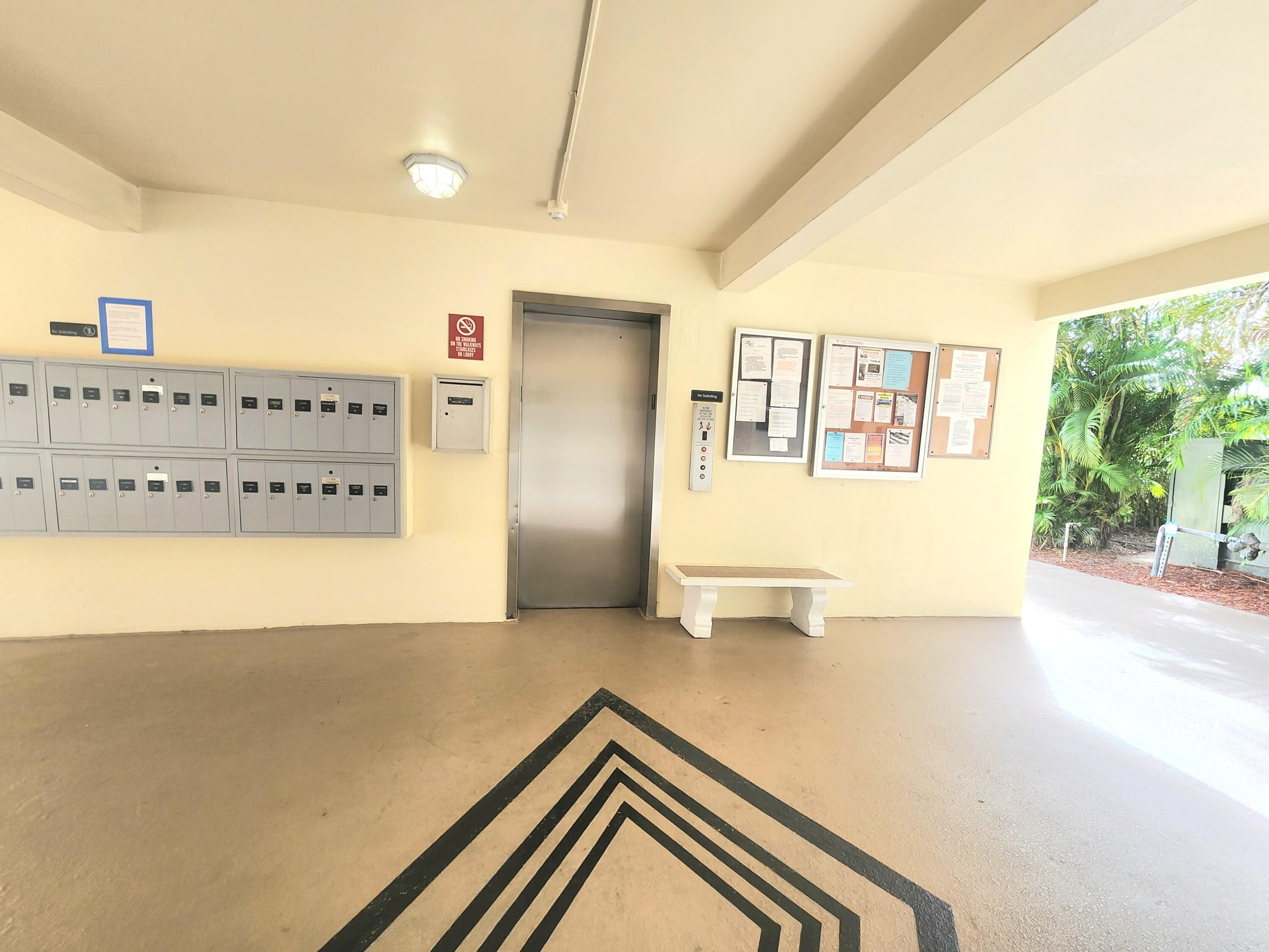 3959 Via Poinciana, Unit 208 Lake Worth, FL 33467 - Photo 29 of 32 ELEVATOR