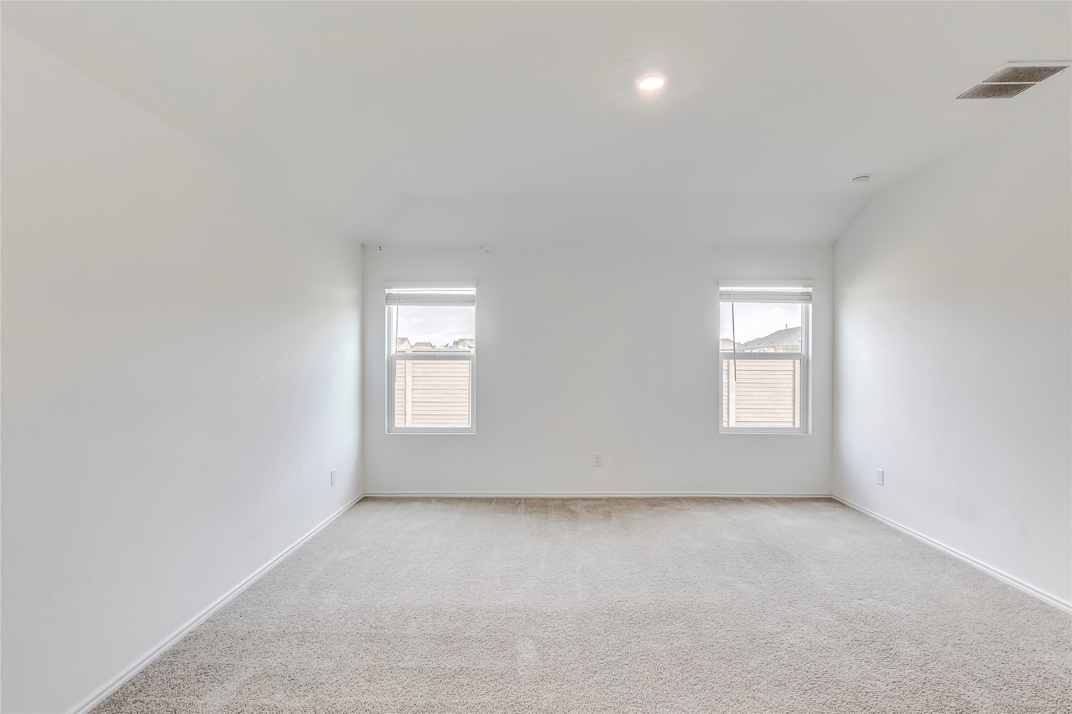 591 Avre Loop Kyle, TX 78640 - Photo 20 of 34 an empty room with a window