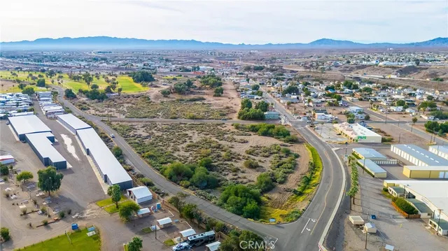 a view of a city with a lake