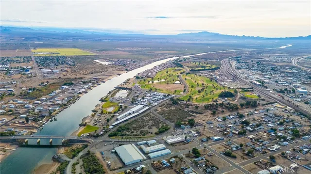 a view of city with ocean