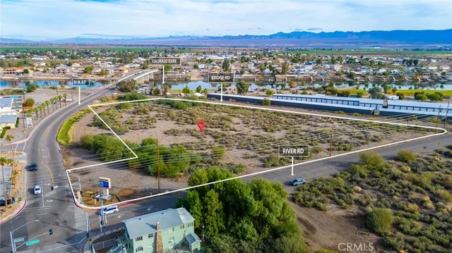 a view of a city with an ocean view