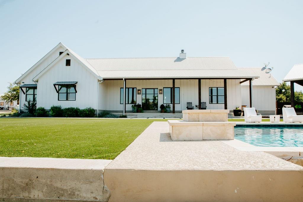 2300 West Fitzhugh Road Dripping Springs, TX 78620 - Photo 5 of 39 a view of a house with a swimming pool