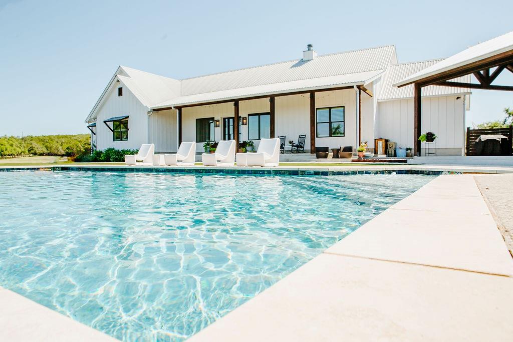 2300 West Fitzhugh Road Dripping Springs, TX 78620 - Photo 6 of 39 a view of swimming pool with outdoor seating